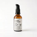 Hair Theory Fiber Sealing Serum, a 50 ml fragrance-free post-wash serum in an amber glass bottle with a black pump.